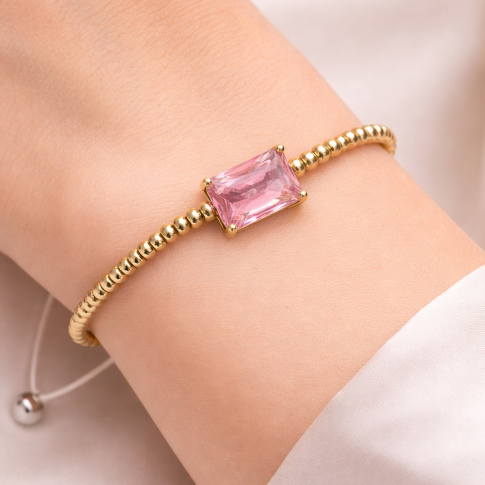 H&Co Pulsera Ajustable Para Damas de Hematita con Dije Pink